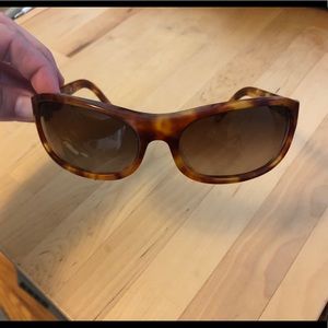 Prada sunglasses- like new, subtle and sporty.